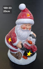 Figurină Moș Crăciun cu pinguin, decor ceramic Crăciun - 20cm