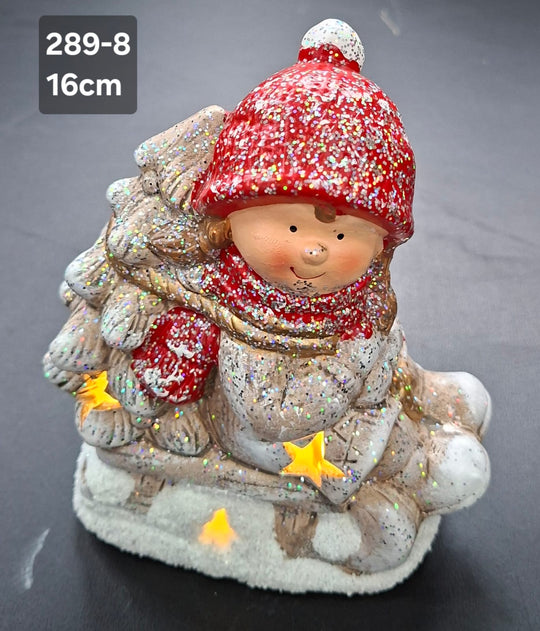 Decor ceramic Crăciun fetiță pe sanie cu brad luminos - 14cm